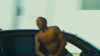 Movie still from “Huey Briss - Regardless” (2019), directed by Michael Priestley – Medium shot, Low angle
