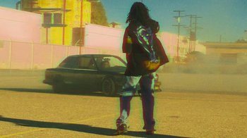 Movie still from “Huey Briss - Regardless” (2019), directed by Michael Priestley – Wide shot, Low angle