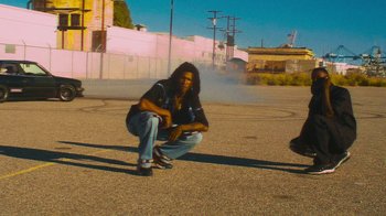 Movie still from “Huey Briss - Regardless” (2019), directed by Michael Priestley – Wide shot, Low angle