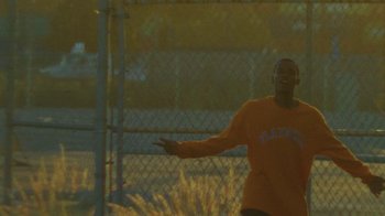 Movie still from “Huey Briss - Regardless” (2019), directed by Michael Priestley – Medium shot, Low angle