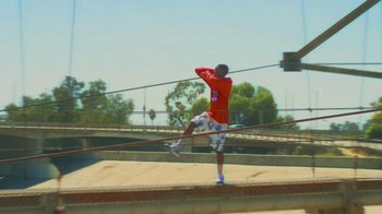 Movie still from “Huey Briss - Regardless” (2019), directed by Michael Priestley – Wide shot, Low angle