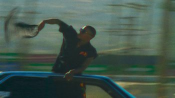 Movie still from “Huey Briss - Regardless” (2019), directed by Michael Priestley – Medium shot, Low angle