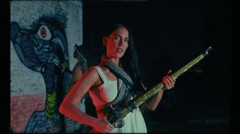 Movie still from “La Chica - Ratas” (2019), directed by Julien Lascar – Medium shot, Low angle