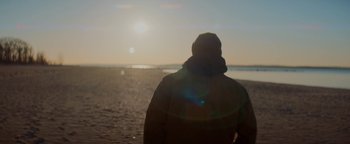 Movie still from “Vonavi - Sunburst feat. Run Rivers” (2019), directed by Daniel Uribe – Medium shot, Low angle