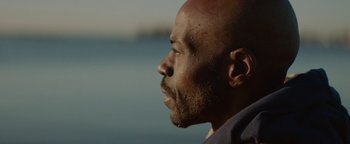 Movie still from “Vonavi - Sunburst feat. Run Rivers” (2019), directed by Daniel Uribe – Close Up shot, Low angle
