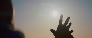 Movie still from “Vonavi - Sunburst feat. Run Rivers” (2019), directed by Daniel Uribe – Extreme Close Up shot, Low angle