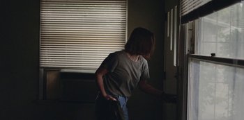 Movie still from “Abstrackt Keal Agram - For No One” (2019), directed by Romain Laurent – Medium shot, Low angle