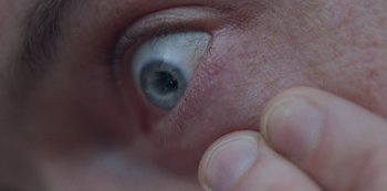 Movie still from “Abstrackt Keal Agram - For No One” (2019), directed by Romain Laurent – Extreme Close Up shot, Overhead angle