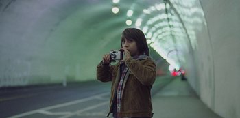 Movie still from “Abstrackt Keal Agram - For No One” (2019), directed by Romain Laurent – Medium shot, Low angle