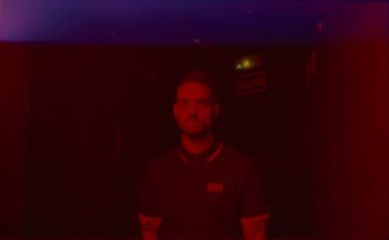 Movie still from “Elio Toffana - Genesis” (2018), directed by Miguel Angulo – Medium shot, Low angle