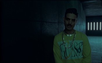 Movie still from “Elio Toffana - Genesis” (2018), directed by Miguel Angulo – Medium shot, Low angle