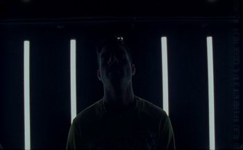 Movie still from “Elio Toffana - Genesis” (2018), directed by Miguel Angulo – Medium shot, Low angle