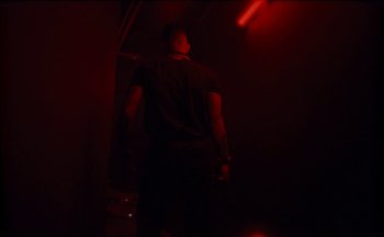 Movie still from “Elio Toffana - Genesis” (2018), directed by Miguel Angulo – Medium shot, Low angle