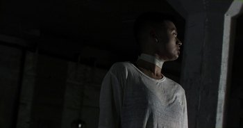 Movie still from “Desto - Exoskeleton” (2018), directed by Kristian Lindén – Medium shot, Low angle