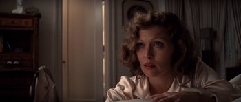 Movie still from “Chinatown” (1974), directed by Roman Polanski – A person sitting in a room; Close Up shot, Over the shoulder angle