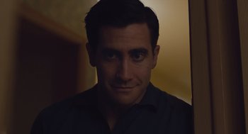 Movie still from “Wildlife” (2018), directed by Paul Dano – A person wearing a black shirt; Close Up shot, Over the shoulder angle