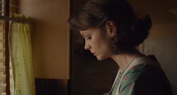 Movie still from “Wildlife” (2018), directed by Paul Dano – A young woman is looking down at her face; Close Up shot, Low angle