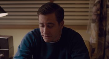 Movie still from “Wildlife” (2018), directed by Paul Dano – A person sitting at a table; Close Up shot, Over the shoulder angle