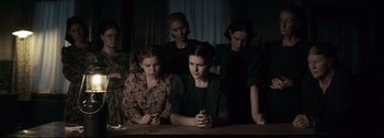 Movie still from “Women Talking” (2022), directed by Sarah Polley – Medium shot, High angle