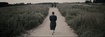 Movie still from “Women Talking” (2022), directed by Sarah Polley – Extreme Wide shot, Over the shoulder angle