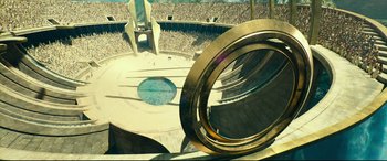 Movie still from “Wonder Woman 1984” (2020), directed by Patty Jenkins – An aerial view of a stadium with a large audience; Extreme Wide shot, Overhead angle