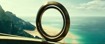 Movie still from “Wonder Woman 1984” (2020), directed by Patty Jenkins – A view of the ocean from a telescope; Extreme Wide shot, High angle