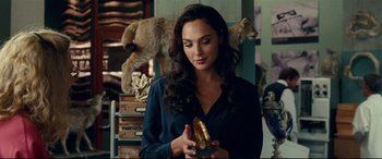 Movie still from “Wonder Woman 1984” (2020), directed by Patty Jenkins – Gal gadot in a scene from wonder woman; Close Up shot, Over the shoulder angle