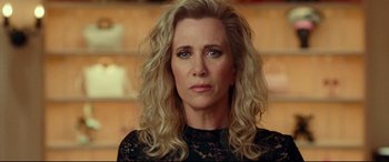 Movie still from “Wonder Woman 1984” (2020), directed by Patty Jenkins – A person with long hair; Close Up shot, Over the shoulder angle