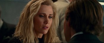 Movie still from “Wonder Woman 1984” (2020), directed by Patty Jenkins – A person talking to another person; Close Up shot, Over the shoulder angle