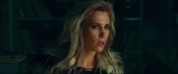 Movie still from “Wonder Woman 1984” (2020), directed by Patty Jenkins – A person with long blonde hair; Close Up shot, Over the shoulder angle