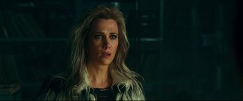 Movie still from “Wonder Woman 1984” (2020), directed by Patty Jenkins – A person with long blonde hair; Close Up shot, Over the shoulder angle