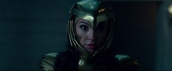 Movie still from “Wonder Woman 1984” (2020), directed by Patty Jenkins – A person wearing a helmet; Close Up shot, Over the shoulder angle