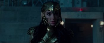 Movie still from “Wonder Woman 1984” (2020), directed by Patty Jenkins – A person wearing a helmet; Close Up shot, Over the shoulder angle