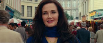 Movie still from “Wonder Woman 1984” (2020), directed by Patty Jenkins – A person with long brown hair; Close Up shot, Over the shoulder angle