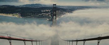 Movie still from “Zodiac” (2007), directed by David Fincher – A view of the golden gate bridge from a helicopter; Extreme Wide shot, High angle