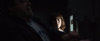 Movie still from “10 Cloverfield Lane” (2016), directed by Dan Trachtenberg – Close Up shot, Over the shoulder angle