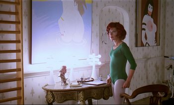 Movie still from “A Clockwork Orange” (1971), directed by Stanley Kubrick – A woman standing in front of a table with vases; Medium shot, Low angle