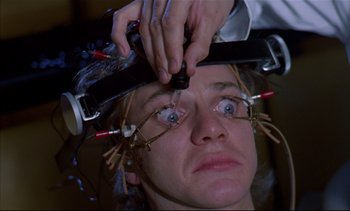 Movie still from “A Clockwork Orange” (1971), directed by Stanley Kubrick – A woman getting her hair dried by a hairstylist; Extreme Close Up shot, High angle