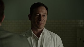 Movie still from “A Cure for Wellness” (2016), directed by Gore Verbinski – A person wearing a white shirt; Close Up shot, Over the shoulder angle
