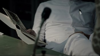 A microphone is sitting in front of a microphone stand