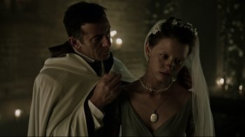 Movie still from “A Cure for Wellness” (2016), directed by Gore Verbinski – A man and a woman are dressed up for a wedding; Close Up shot, Over the shoulder angle