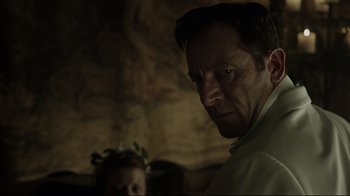 Movie still from “A Cure for Wellness” (2016), directed by Gore Verbinski – A person wearing a white shirt; Close Up shot, Over the shoulder angle