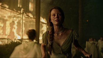Movie still from “A Cure for Wellness” (2016), directed by Gore Verbinski – A young woman with long red hair wearing a dress; Medium shot, Low angle