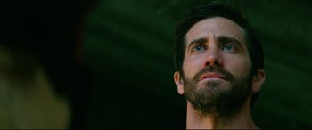 Movie still from “Ambulance” (2022), directed by Michael Bay – A person with a beard; Close Up shot, Low angle