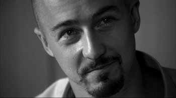Movie still from “American History X” (1998), directed by Tony Kaye – Black and white photograph of a man with a beard; Close Up shot, Low angle