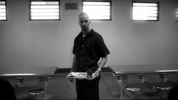 Movie still from “American History X” (1998), directed by Tony Kaye – A man holding a tray of food standing in a room; Medium shot, Low angle