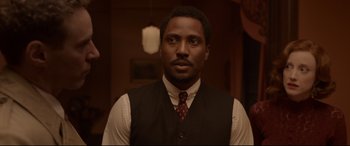 Movie still from “Amsterdam” (2022), directed by David O. Russell – Close Up shot, Over the shoulder angle