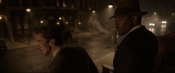 Movie still from “Amsterdam” (2022), directed by David O. Russell – Medium shot, Over the shoulder angle