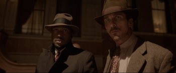 Movie still from “Amsterdam” (2022), directed by David O. Russell – Medium shot, Low angle