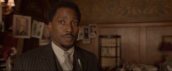 Movie still from “Amsterdam” (2022), directed by David O. Russell – Close Up shot, Over the shoulder angle